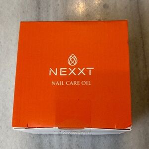 Nexx Nail Care Oil in White and Orange Packaging